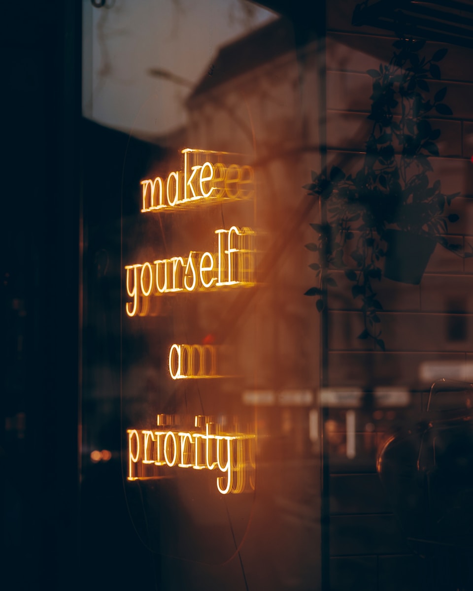 Photo by Eric Soubeyrand A neon sign that says make yourself on priority